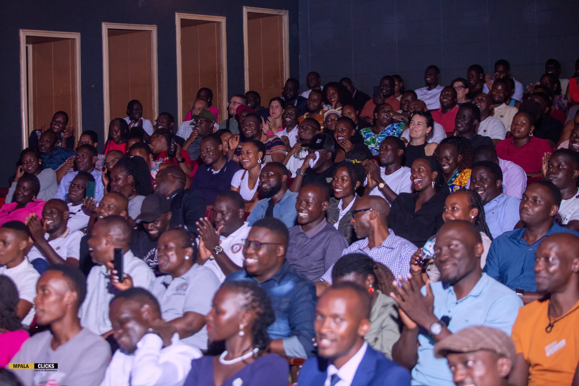 Dr. Hilary Okello performing